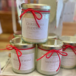 Christmas candle in clear jar