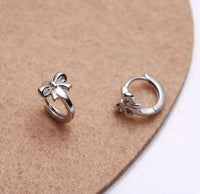 Bow huggie earrings by Greenwood Designs