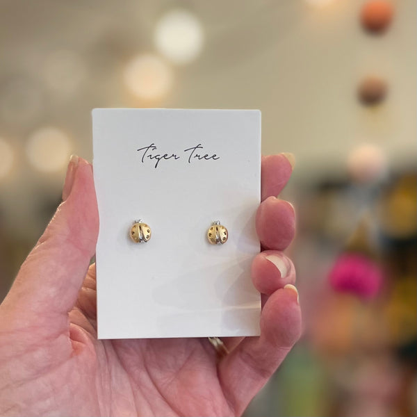 Gold ladybird studs by Tiger Tree