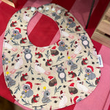 Cloth Christmas bib with waterproof back by Mopebi