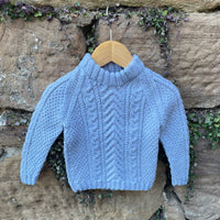 Hand-knitted cable jumper