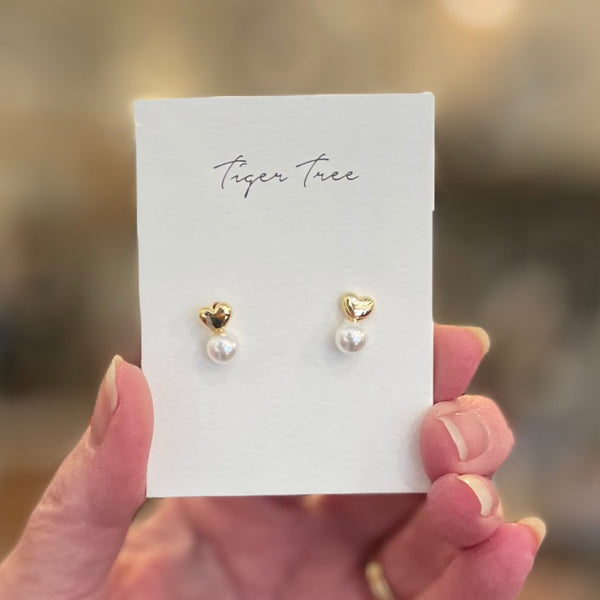 Gold mini heart and pearl studs by Tiger Tree