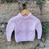 Hand-knitted cable jumper