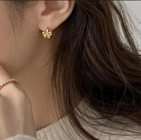 Bow huggie earrings by Greenwood Designs