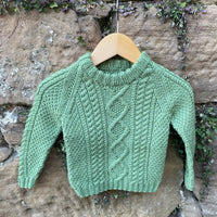 Hand-knitted cable jumper