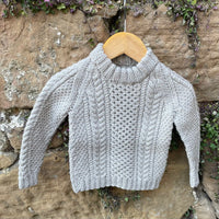 Hand-knitted cable jumper