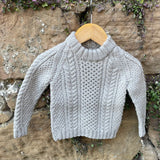 Hand-knitted cable jumper