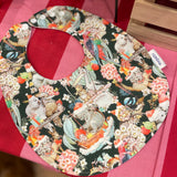 Cloth Christmas bib with waterproof back by Mopebi