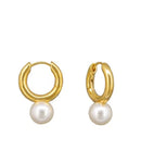 Gold pearl drop huggies by Tiger Tree
