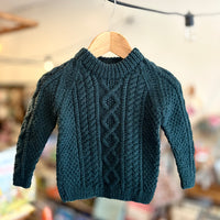 Hand-knitted cable jumper