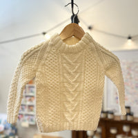 Hand-knitted cable jumper
