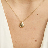 Gold shell & pearl necklace by Tiger Tree