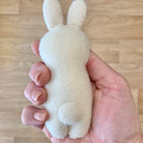 Hand-embroidered felt bunny