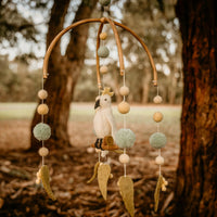 Felt cot mobile by Tara Treasures – cockatoo